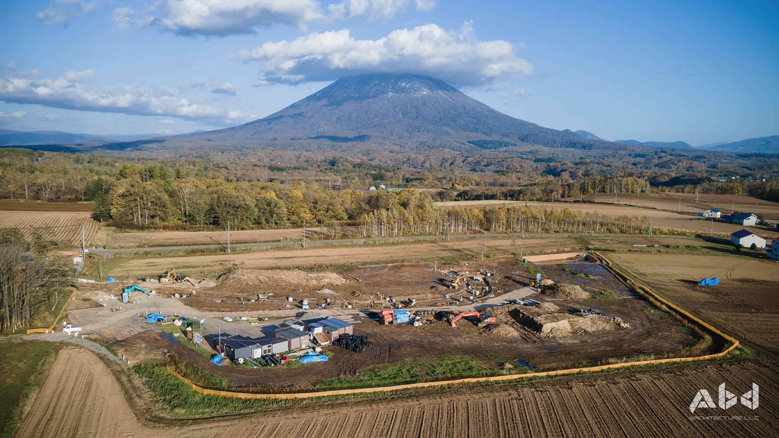 Niseko Soga onsen luxury land development project under construction shot by drone in front of mt yotei in Hokkaido, Japan